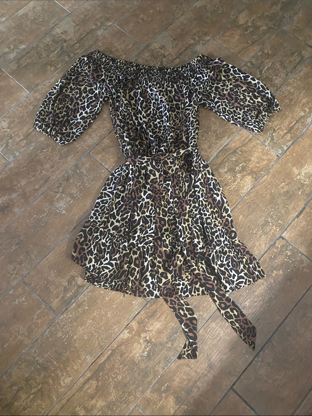 Lilly Pulitzer Animal Print Romper. Tie waist. Can be off shoulder. Size small.